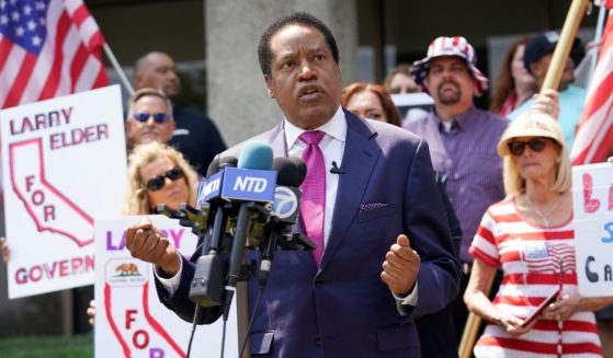 Radio talk show host Larry Elder speaks to supporters during a campaign stop in Norwalk, California, on July 13, 2021.