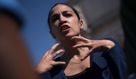 Democratic Rep. Alexandria Ocasio-Cortez of New York speaks with supporters during an event outside Union Station June 16, 2021, in Washington, D.C.