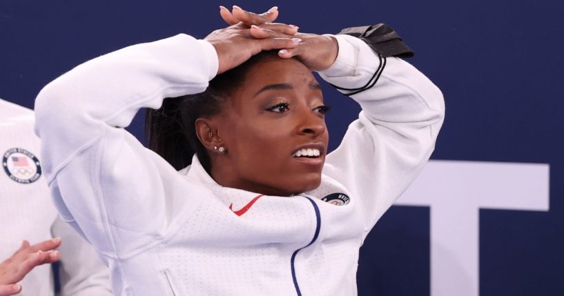 Simone Biles reacts during the women's gymnastics team final of the Tokyo Olympic Games at the Ariake Gymnastics Centre on Tuesday.