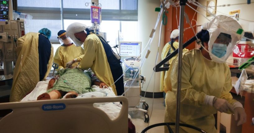 Physicians and medical staff care for a COVID-19 patient in December in the intensive care unit at Sharp Grossmont Hospital in La Mesa, California, in the southern part of the state.