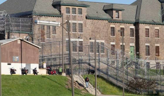 An employee leaves the maximum-security Clinton Correctional Facility in Dannemora, N.Y., in 2015. The facility is one of 50 state prisons in New York.