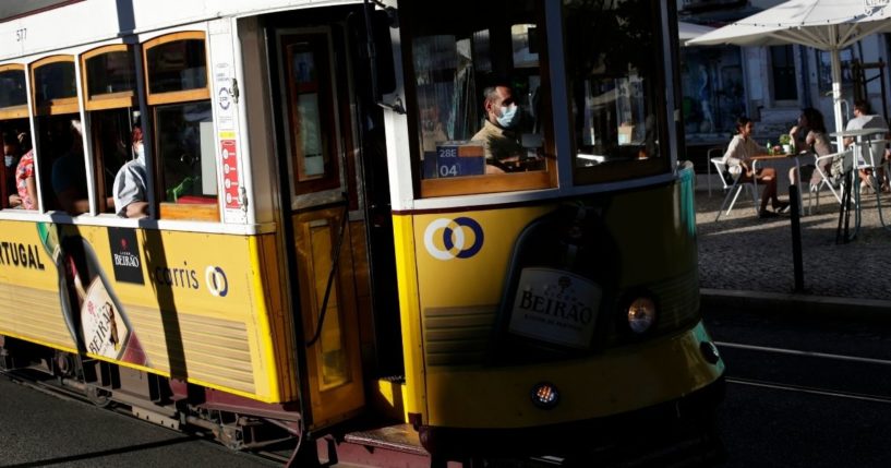 A tram is seen in this Monday photo driving through the Graca neighborhood in the Portuguese city of Lisbon.