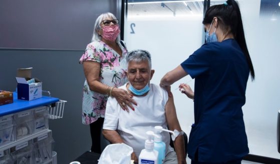 A leukemia patient receives his third dose of the COVID-19 vaccine at the Sheba Medical Center in Ramat Gan, Israel, on July, 14, 2021.