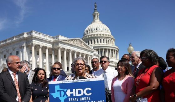 Joined by fellow Texas state House Democrats, Rep. Senfronia Thompson speaks during a news conference on voting rights outside the U.S. Capitol on July 13.