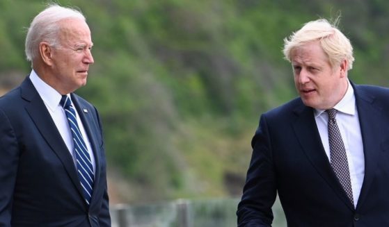 U.S. President Joe Biden, left, speaks with U.K. Prime Minister Boris Johnson outside Carbis Bay Hotel on June 10, 2021, near St Ives, England.