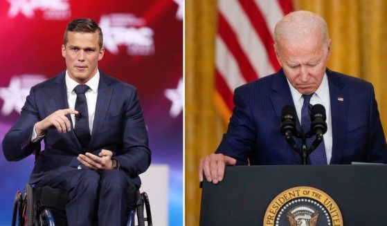 Rep. Madison Cawthorn addresses the Conservative Political Action Conference on Feb. 26, 2021, in Orlando. President Joe Biden pauses while he speaks about the situation in Afghanistan in the East Room of the White House on Thursday in Washington, D.C.