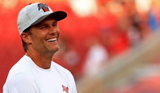 Tom Brady of the Tampa Bay Buccaneers looks on during a preseason game against the Tennessee Titans at Raymond James Stadium on Saturday in Tampa, Florida.