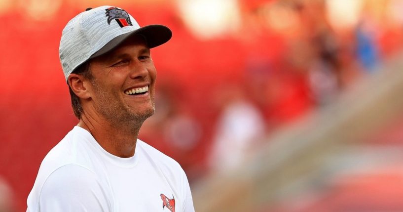 Tom Brady of the Tampa Bay Buccaneers looks on during a preseason game against the Tennessee Titans at Raymond James Stadium on Saturday in Tampa, Florida.