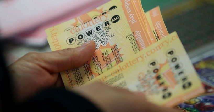 A customer is seen buying Powerball tickets at Kavanagh Liquors in San Lorenzo, California, on Jan. 13, 2016.