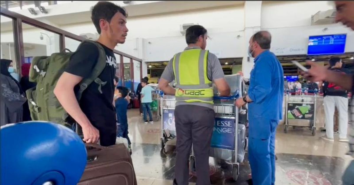 Passengers walk through Kabul International Airport in Kabul, Afghanistan, on Friday.