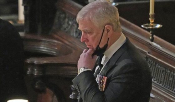 Prince Andrew is seen standing inside St. George’s Chapel at Windsor Castle in Windsor, England, in a photo taken on April 17, 2021.