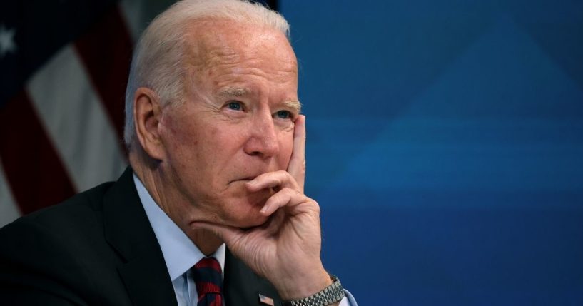 President Joe Biden attends a virtual conference in the South Court Auditorium in the Eisenhower Executive Office Building in Washington on Monday.