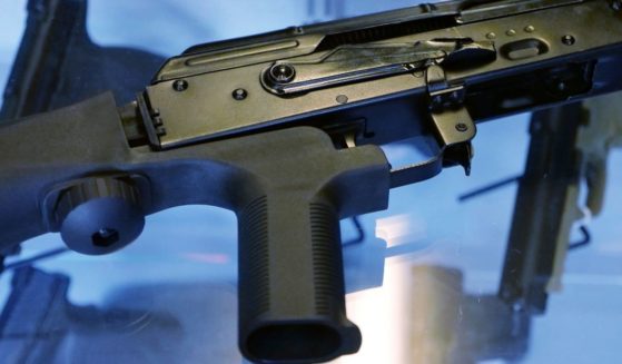 A bump stock is seen attached to a semi-automatic rifle at the Gun Vault store and shooting range in South Jordan, Utah, on Oct. 4, 2017.