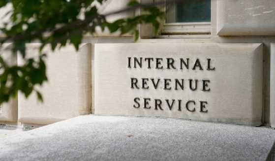 This May 4, 2021, photo shows a sign outside the Internal Revenue Service building in Washington, D.C.