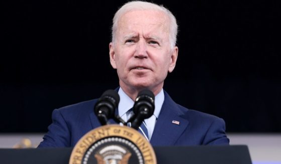 President Joe Biden delivers remarks ahead of receiving a third dose of the Pfizer/BioNTech COVID-19 vaccine in the South Court Auditorium in the White House on Monday in Washington, D.C.