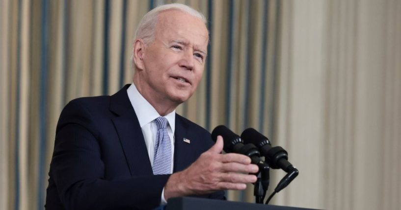 President Joe Biden gestures as he delivers remarks on his administration’s COVID-19 response and vaccination program at the White House on Friday.