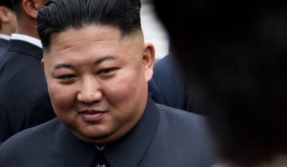 North Korean dictator Kim Jong Un walks to a meeting with then-President Donald Trump in the Demilitarized Zone on June 30, 2019, in Panmunjom, Korea.