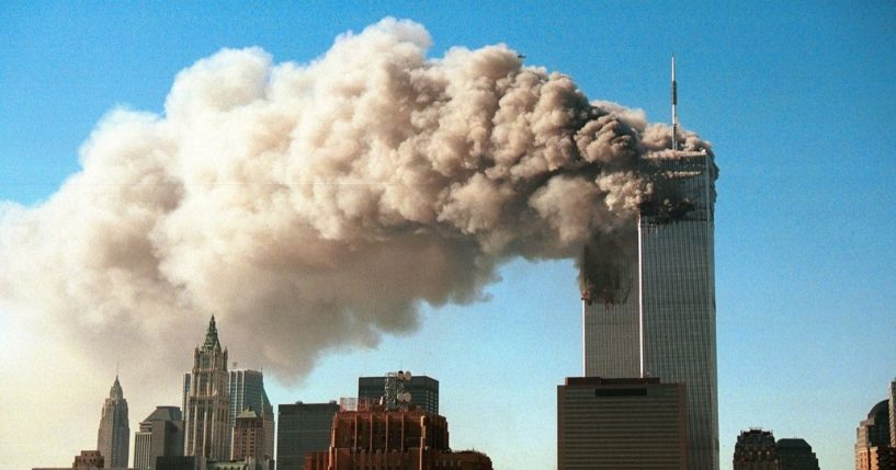 Smoke pours from the twin towers of the World Trade Center after they were hit by two hijacked airliners in a terrorist attack on Sept. 11, 2001, in New York City.