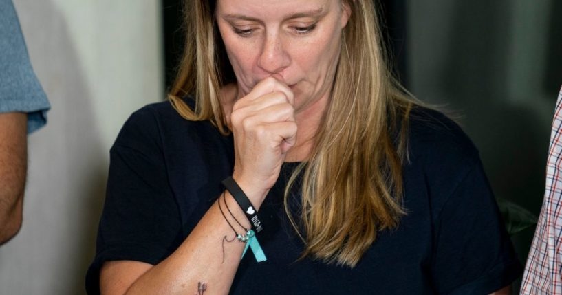 Gabby Petito’s mother is seen holding back tears during a news conference on Tuesday in Bohemia, New York.