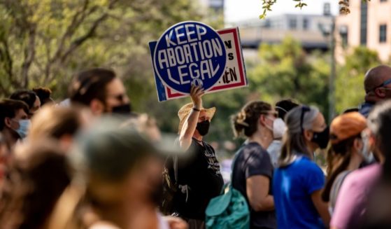 Abortion activists are seen outside the Texas State Capitol in Austin, Texas, on Sept. 11, 2021.