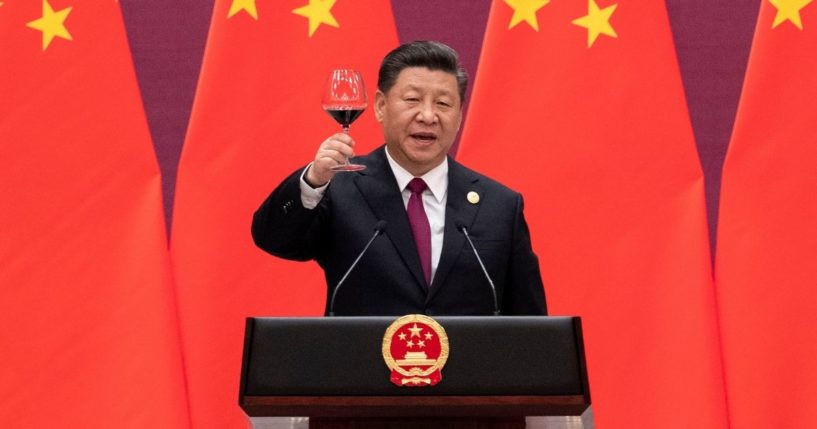 Chinese President Xi Jinping raises his glass and proposes a toast during the welcome banquet for visiting leaders attending the Belt and Road Forum at the Great Hall of the People in Beijing on April 26, 2019.