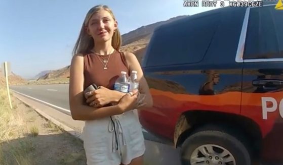 This police camera video provided by The Moab Police Department shows Gabrielle "Gabby" Petito talking to a police officer after police pulled over the van she was traveling in with Brian Laundrie near the entrance to Arches National Park on Aug. 12, 2021.