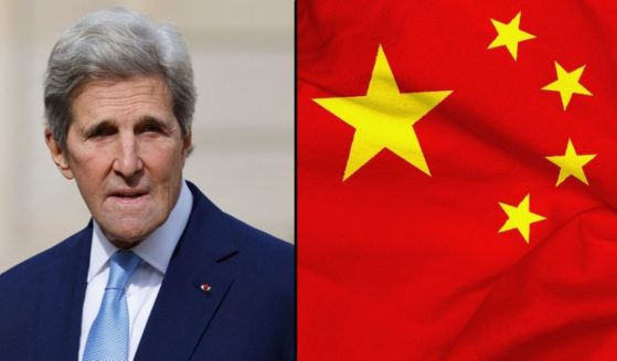 John Kerry arrives for a meeting at the Elysee Palace in Paris on Oct. 4. The Chinese flag is seen in the stock image on the right.