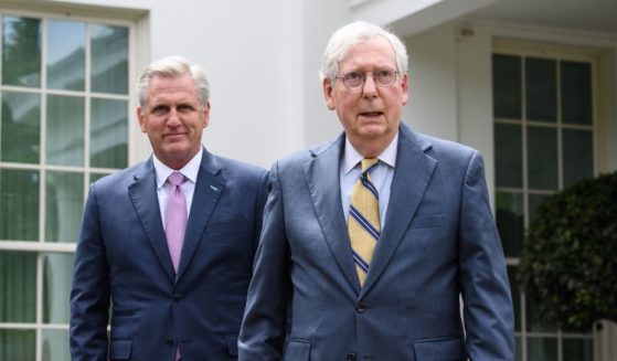 House Minority Leader Kevin McCarthy, left, and Senate Minority Leader Mitch McConnell arrive to speak to the media following their meeting with President Joe Biden and Democratic congressional leaders at the White House in Washington, D.C., on May 12, 2021.