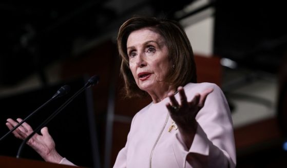 House Speaker Nancy Pelosi gestures as she speaks at her weekly news conference at the U.S. Capitol Building on Thursday in Washington, D.C.