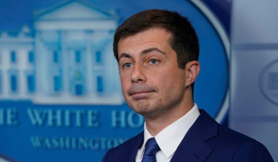 Secretary of Transportation Security Pete Buttigieg attends a news conference at the White House on May 12.