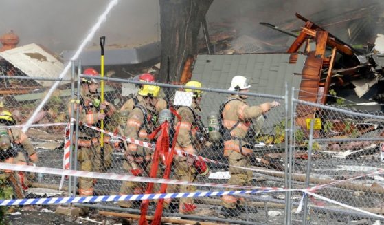 Firefighters in Portland, Oregon, battle a fire caused by a powerful natural gas explosion in Oct. 2019.