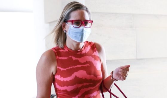 Democratic Sen. Kyrsten Sinema of Arizona arrives at the U.S. Capitol in Washington on Thursday.