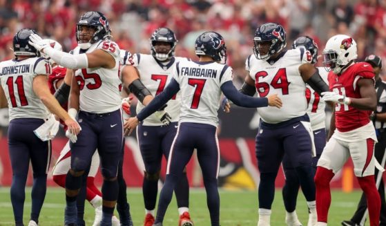 Ka'imi Fairbairn, #7 of the Houston Texans, celebrates with teammates after kicking a field goal in the second quarter against the Arizona Cardinals in the game at State Farm Stadium on Sunday in Glendale, Arizona.