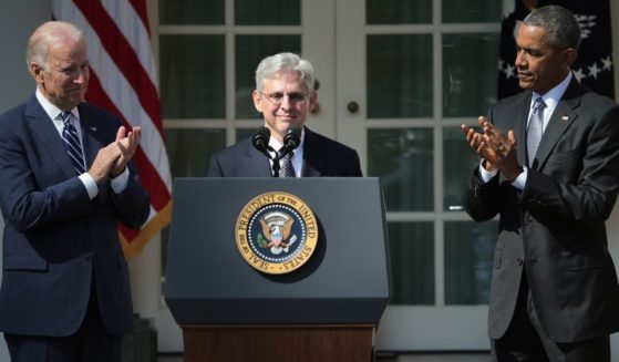 Then-President Barack Obama and then-Vice President Joe Biden stands with then-Judge Merrick B. Garland while nominating him to the U.S. Supreme Court, in the Rose Garden at the White House, March 16, 2016, in Washington, D.C.