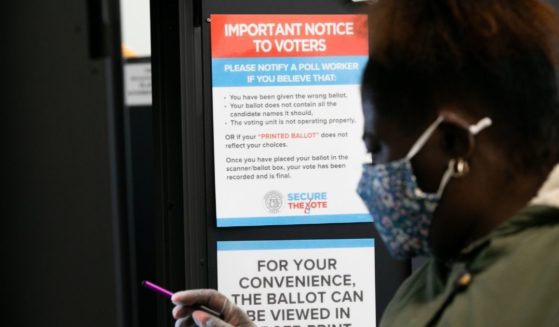 A voter casts a ballot at the Metropolitan Library in Atlanta, Georgia, on Nov. 3, 2020.