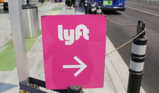 A Lyft sign sits at a rideshare lot at Los Angeles International Airport (LAX) in Los Angeles on Aug. 20, 2020.