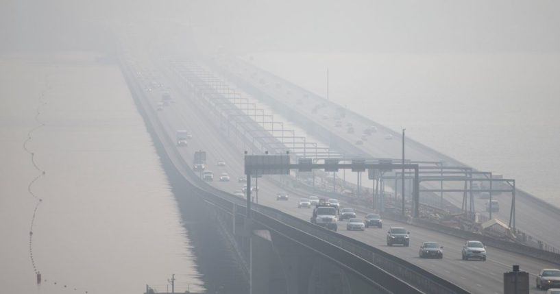 Cars drive over the I-90 bridge over Lake Washington in Seattle, Washington, on Sept. 11, 2020.