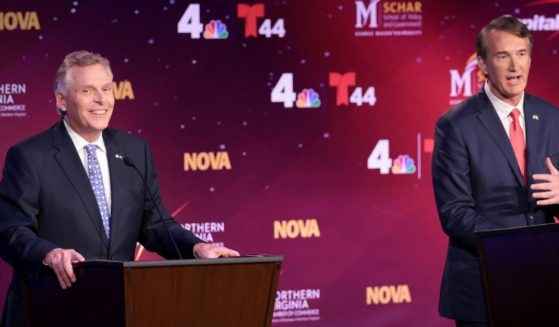 Former Virginia Gov. Terry McAuliffe, left, and Republican gubernatorial candidate Glenn Youngkin, right, debate each other in Alexandria, Virginia, on Sept. 28.