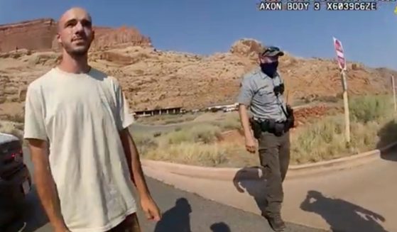 This Aug. 12 file photo from video provided by the Moab, Utah, Police Department shows Brian Laundrie talking to a police officer after police pulled over the van he was traveling in with Gabrielle "Gabby" Petito, near the entrance to Arches National Park in Utah.