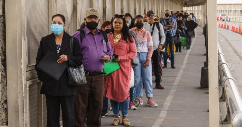 People wait in line to clear customs and enter the United States at the Paso Del Norte Port of Entry in downtown El Paso, Texas, on Nov. 8.