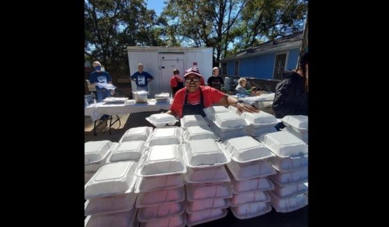 Pensacola Pastor Sylvia Tisdale of Epps Christian Center helps package food to give to the community in Pensacola, Florida.