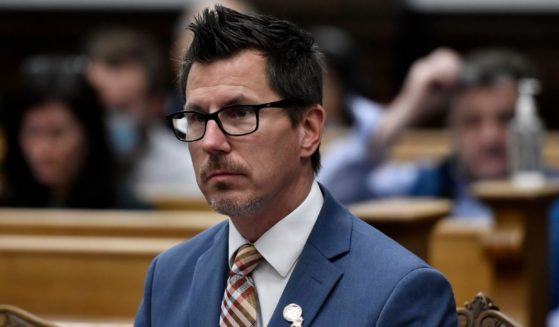 Assistant District Attorney Thomas Binger listens as Judge Bruce Schroeder speaks during Kyle Rittenhouse's trial at the Kenosha County Courthouse on Tuesday in Kenosha, Wisconsin.