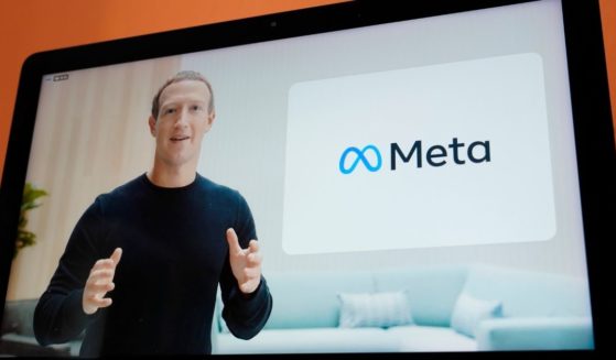 Seen on the screen of a device in Sausalito, Calif., Facebook CEO Mark Zuckerberg announces the company's new corporate name, Meta, during a virtual event on Oct. 28, 2021.