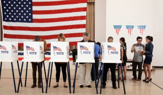 People vote in this stock photo. In New York City, a bill titled 'Our City, Our Vote' would allow more than 800,000 noncitizen New Yorkers to vote.