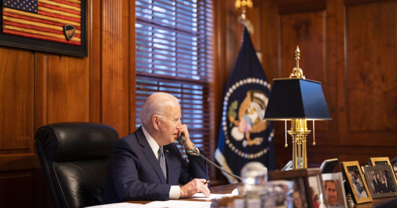 President Joe Biden speaks with Russian President Vladimir Putin on the phone from Biden's private residence in Wilmington, Del., on Dec. 30, 2021