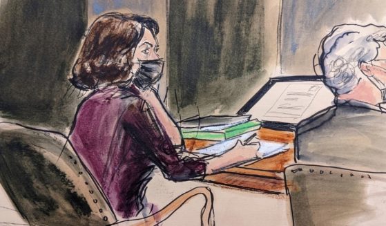 In this courtroom sketch, Ghislaine Maxwell, left, sits at the defense table with defense attorney Jeffrey Pagliuca while listening to testimony in her sex abuse trial on Thursday in New York.