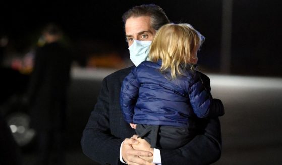 Hunter Biden is seen on the tarmac after stepping off Air Force One upon arrival at Nantucket Memorial Airport in Nantucket, Massachusetts, on Nov. 23.