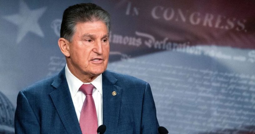 Democratic Sen. Joe Manchin of West Virginia speaks with reporters during a news conference on Capitol Hill on Nov. 1 in Washington.