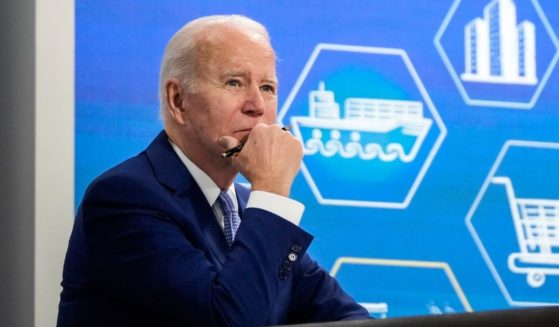 President Joe Biden listens during a meeting with his administration's Supply Chain Disruptions Task Force and private sector CEOs in the South Court Auditorium of the White House on Wednesday in Washington, D.C.