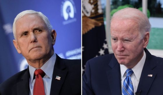 On Monday, former Vice President Mike Pence, left, announced that his advocacy group, Advancing American Freedom, has filed an amicus brief opposing the vaccination mandate imposed on large employers by President Joe Biden.